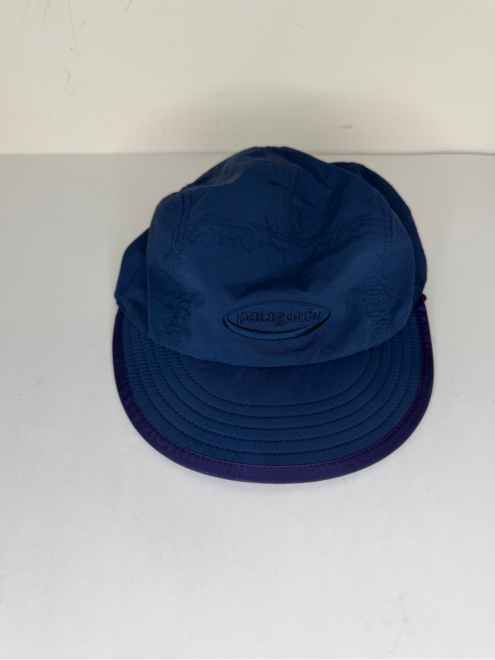 Patagonia Blue Cycling Cap Chin Strap Size Medium Hat 100%nylon
